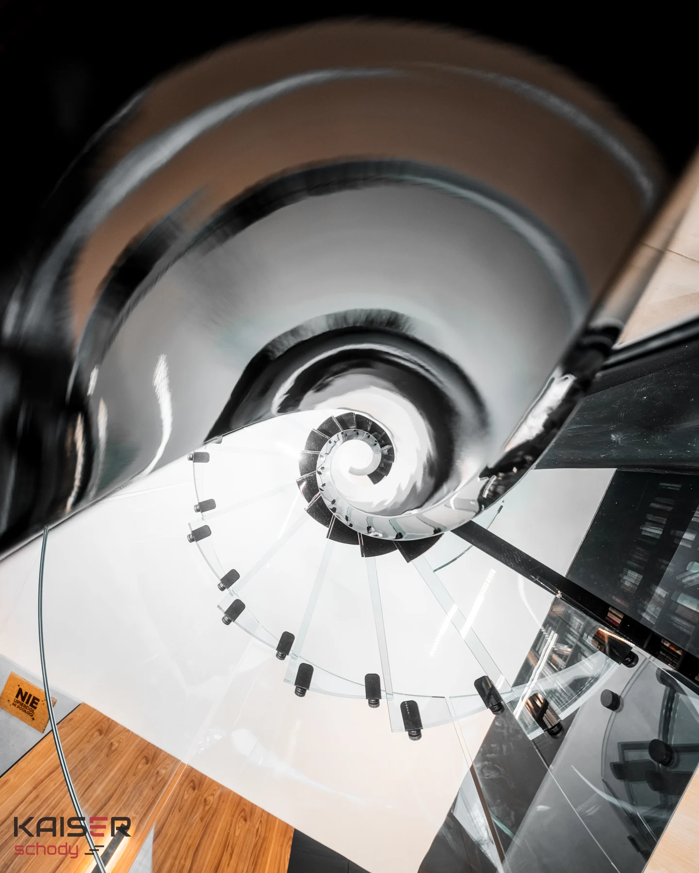Spiral staircase with glass treads — view 04